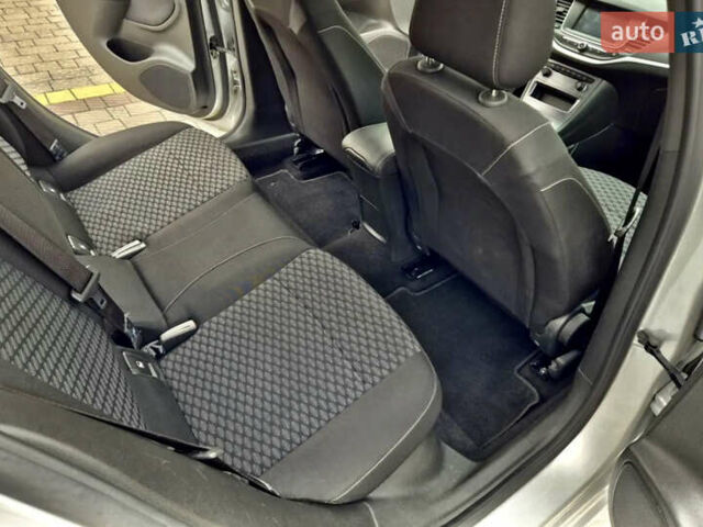 Серый Опель Астра, объемом двигателя 1.5 л и пробегом 270 тыс. км за 9999 $, фото 24 на Automoto.ua