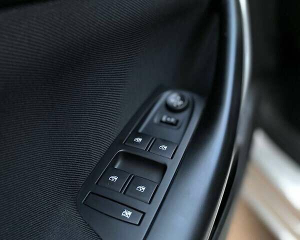 Серый Опель Астра, объемом двигателя 1.5 л и пробегом 115 тыс. км за 12599 $, фото 25 на Automoto.ua