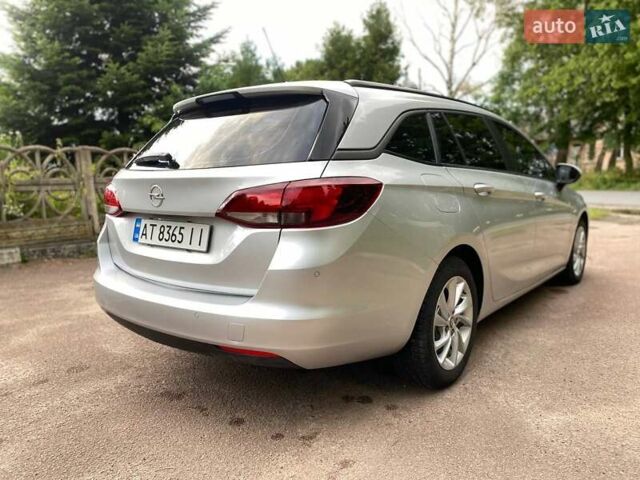 Серый Опель Астра, объемом двигателя 1.5 л и пробегом 115 тыс. км за 12599 $, фото 7 на Automoto.ua