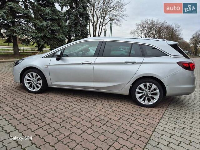 Сірий Опель Астра, об'ємом двигуна 1.5 л та пробігом 142 тис. км за 13700 $, фото 8 на Automoto.ua