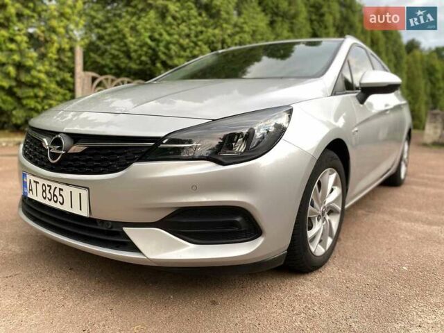Серый Опель Астра, объемом двигателя 1.5 л и пробегом 115 тыс. км за 12599 $, фото 3 на Automoto.ua