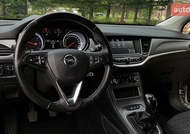 Серый Опель Астра, объемом двигателя 1.5 л и пробегом 115 тыс. км за 12599 $, фото 10 на Automoto.ua