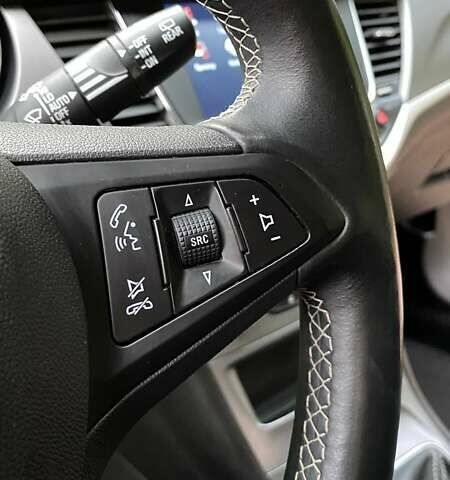 Серый Опель Астра, объемом двигателя 1.5 л и пробегом 115 тыс. км за 12599 $, фото 19 на Automoto.ua