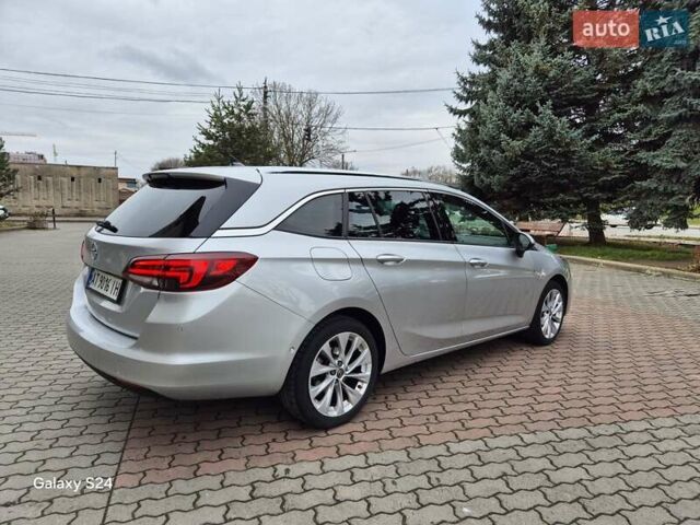 Сірий Опель Астра, об'ємом двигуна 1.5 л та пробігом 142 тис. км за 13700 $, фото 5 на Automoto.ua