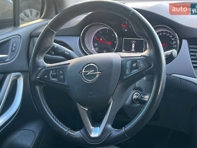 Серый Опель Астра, объемом двигателя 1.5 л и пробегом 110 тыс. км за 13000 $, фото 14 на Automoto.ua