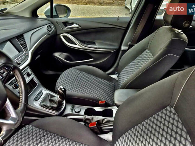 Серый Опель Астра, объемом двигателя 1.5 л и пробегом 270 тыс. км за 9999 $, фото 4 на Automoto.ua