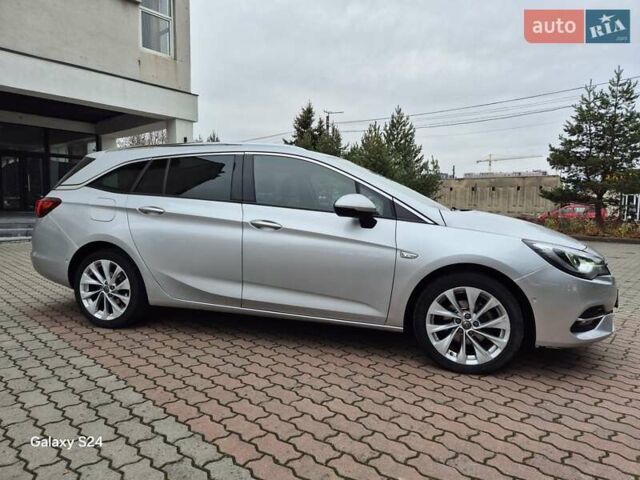 Сірий Опель Астра, об'ємом двигуна 1.5 л та пробігом 142 тис. км за 13700 $, фото 4 на Automoto.ua