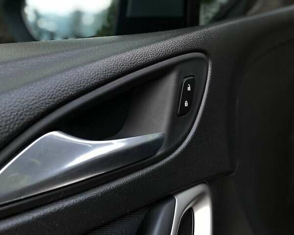 Серый Опель Астра, объемом двигателя 1.5 л и пробегом 115 тыс. км за 12599 $, фото 23 на Automoto.ua