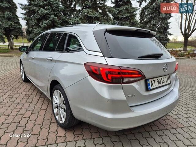Сірий Опель Астра, об'ємом двигуна 1.5 л та пробігом 142 тис. км за 13700 $, фото 7 на Automoto.ua