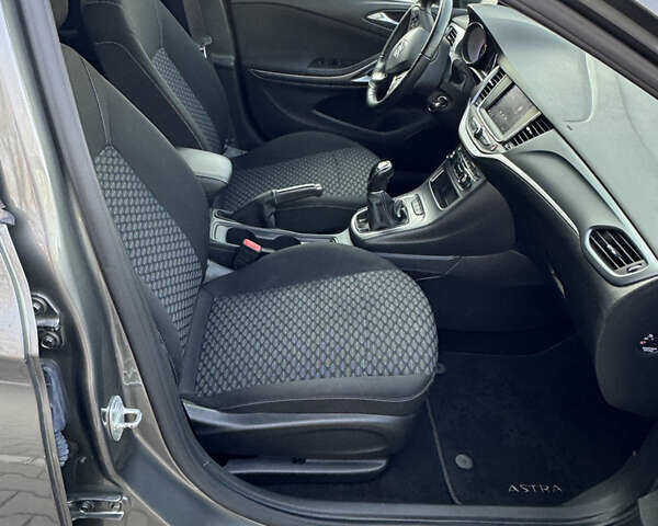 Сірий Опель Астра, об'ємом двигуна 1.5 л та пробігом 142 тис. км за 12800 $, фото 17 на Automoto.ua