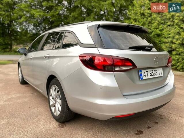 Серый Опель Астра, объемом двигателя 1.5 л и пробегом 115 тыс. км за 12599 $, фото 6 на Automoto.ua