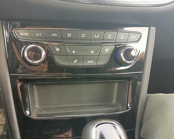 Серый Опель Астра, объемом двигателя 1.5 л и пробегом 188 тыс. км за 14200 $, фото 6 на Automoto.ua