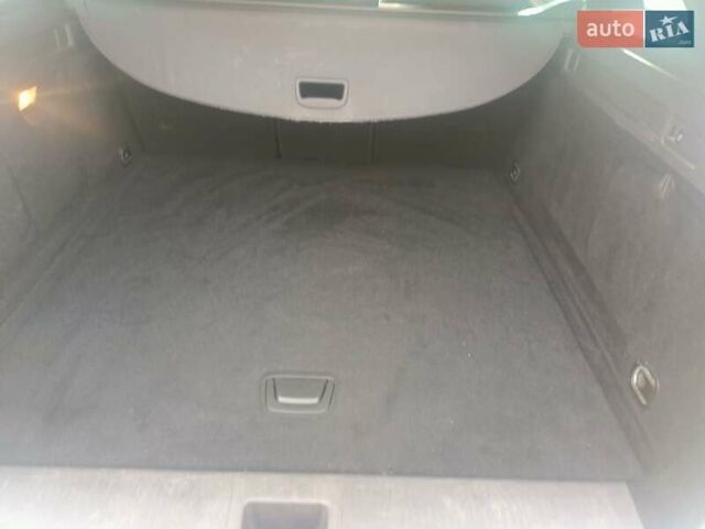 Серый Опель Астра, объемом двигателя 1.5 л и пробегом 188 тыс. км за 14200 $, фото 13 на Automoto.ua