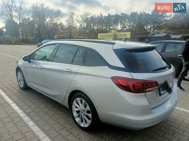 Серый Опель Астра, объемом двигателя 1.5 л и пробегом 188 тыс. км за 14200 $, фото 7 на Automoto.ua