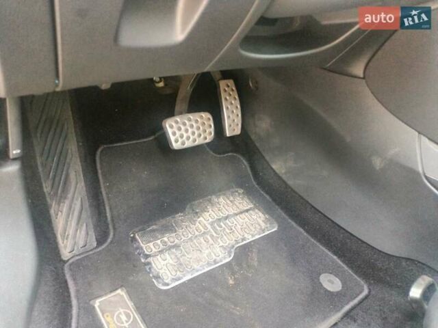 Серый Опель Астра, объемом двигателя 1.5 л и пробегом 188 тыс. км за 14200 $, фото 26 на Automoto.ua