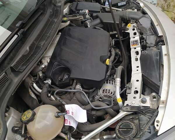 Серый Опель Астра, объемом двигателя 1.5 л и пробегом 129 тыс. км за 13400 $, фото 21 на Automoto.ua