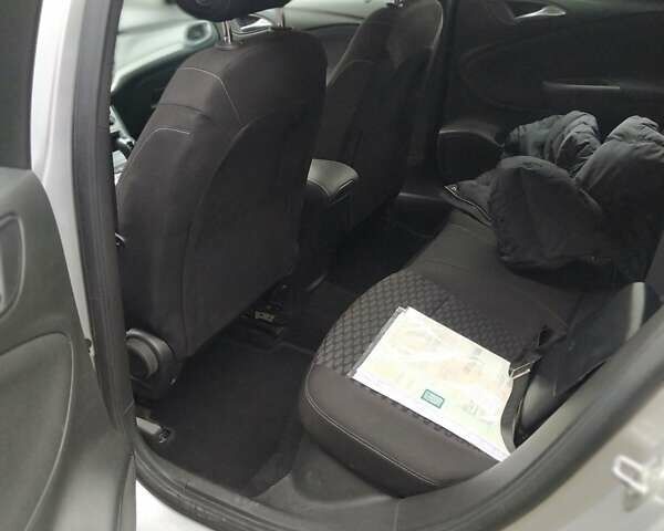 Серый Опель Астра, объемом двигателя 1.5 л и пробегом 129 тыс. км за 13400 $, фото 13 на Automoto.ua