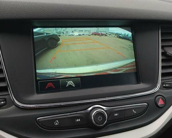 Серый Опель Астра, объемом двигателя 1.5 л и пробегом 129 тыс. км за 13400 $, фото 23 на Automoto.ua