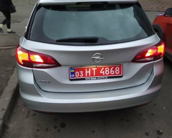 Серый Опель Астра, объемом двигателя 1.5 л и пробегом 129 тыс. км за 13400 $, фото 5 на Automoto.ua