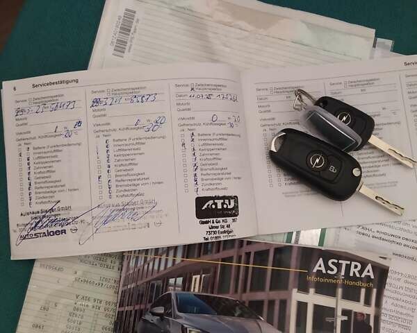 Серый Опель Астра, объемом двигателя 1.5 л и пробегом 129 тыс. км за 13400 $, фото 25 на Automoto.ua