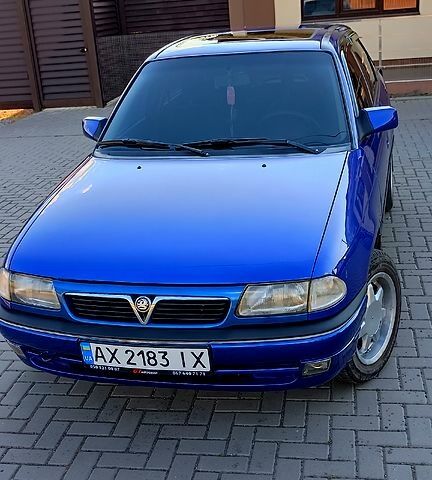 Синий Опель Астра, объемом двигателя 2 л и пробегом 350 тыс. км за 3500 $, фото 6 на Automoto.ua