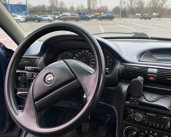 Синий Опель Астра, объемом двигателя 1.6 л и пробегом 418 тыс. км за 2600 $, фото 18 на Automoto.ua