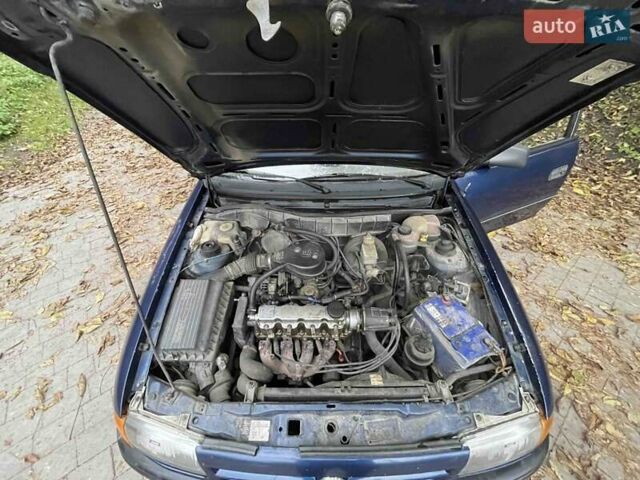 Синий Опель Астра, объемом двигателя 1.6 л и пробегом 300 тыс. км за 1500 $, фото 16 на Automoto.ua