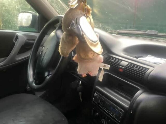 Синий Опель Астра, объемом двигателя 1.7 л и пробегом 350 тыс. км за 700 $, фото 5 на Automoto.ua