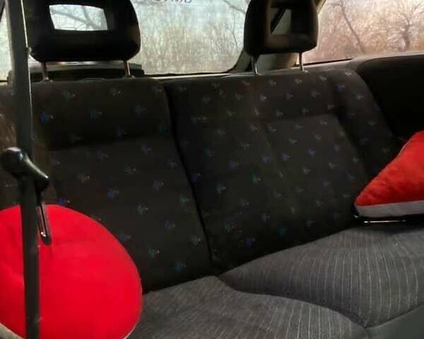 Синий Опель Астра, объемом двигателя 1.7 л и пробегом 350 тыс. км за 700 $, фото 4 на Automoto.ua