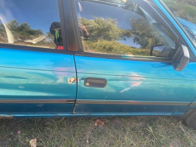 Синий Опель Астра, объемом двигателя 1.6 л и пробегом 330 тыс. км за 1023 $, фото 3 на Automoto.ua