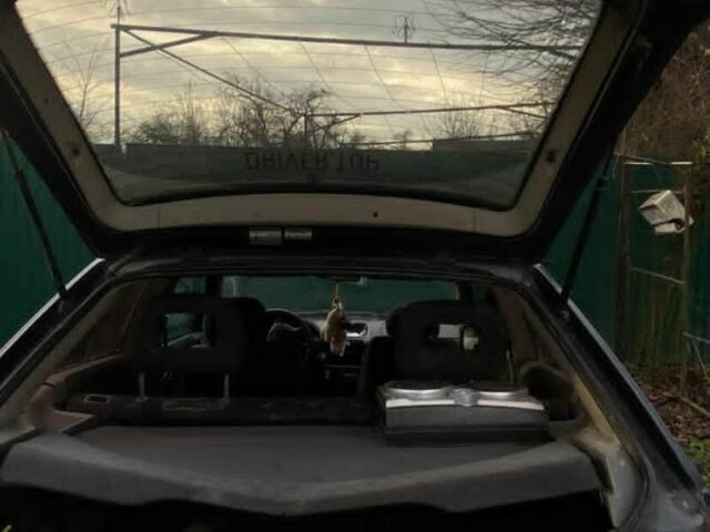 Синий Опель Астра, объемом двигателя 1.7 л и пробегом 350 тыс. км за 700 $, фото 7 на Automoto.ua