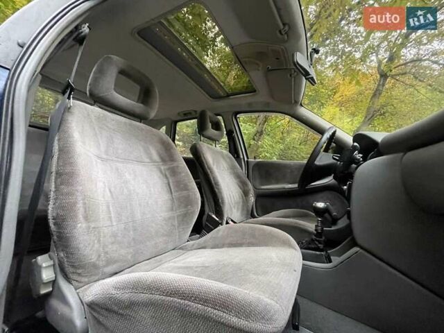 Синий Опель Астра, объемом двигателя 1.6 л и пробегом 300 тыс. км за 1500 $, фото 24 на Automoto.ua