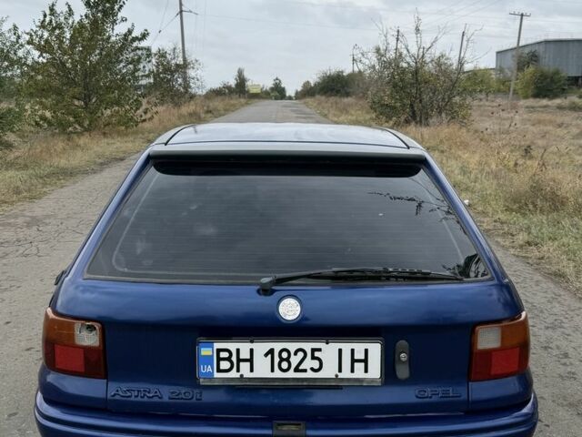 Синій Опель Астра, об'ємом двигуна 2 л та пробігом 200 тис. км за 750 $, фото 4 на Automoto.ua