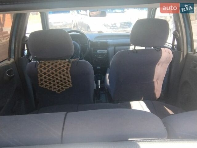 Синий Опель Астра, объемом двигателя 1.4 л и пробегом 278 тыс. км за 1950 $, фото 54 на Automoto.ua