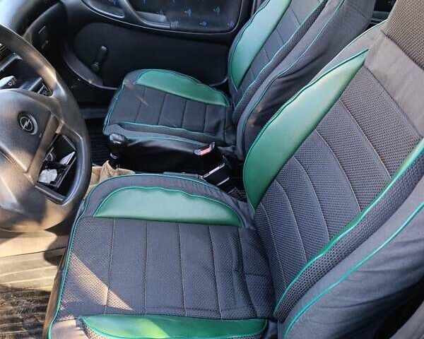 Синий Опель Астра, объемом двигателя 1.4 л и пробегом 404 тыс. км за 1500 $, фото 5 на Automoto.ua