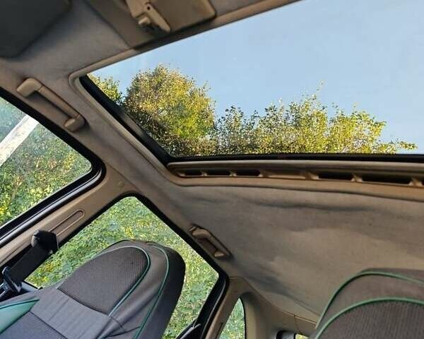 Синий Опель Астра, объемом двигателя 1.4 л и пробегом 404 тыс. км за 1500 $, фото 6 на Automoto.ua