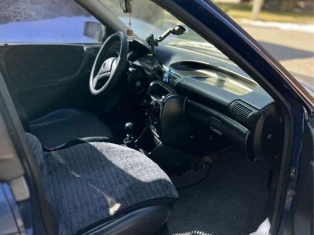 Синий Опель Астра, объемом двигателя 1.4 л и пробегом 400 тыс. км за 1600 $, фото 5 на Automoto.ua