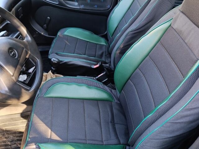 Синий Опель Астра, объемом двигателя 1.4 л и пробегом 404 тыс. км за 1500 $, фото 6 на Automoto.ua