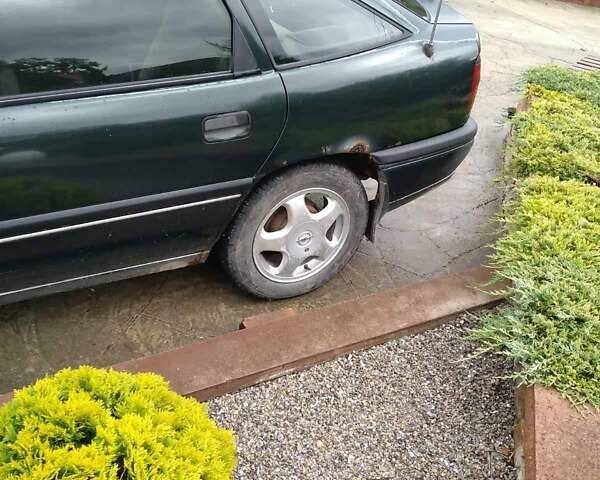 Синий Опель Астра, объемом двигателя 1.8 л и пробегом 402 тыс. км за 1000 $, фото 1 на Automoto.ua