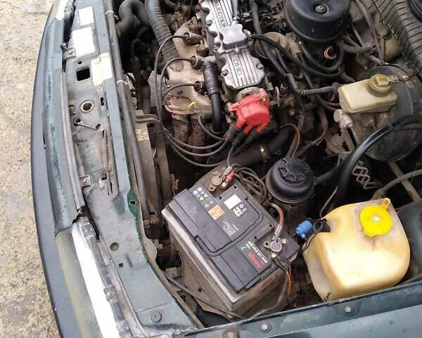 Синий Опель Астра, объемом двигателя 1.8 л и пробегом 402 тыс. км за 1000 $, фото 2 на Automoto.ua