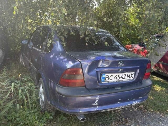 Синий Опель Астра, объемом двигателя 1.8 л и пробегом 249 тыс. км за 600 $, фото 2 на Automoto.ua