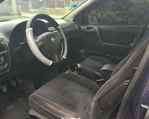 Синий Опель Астра, объемом двигателя 2 л и пробегом 312 тыс. км за 2700 $, фото 1 на Automoto.ua
