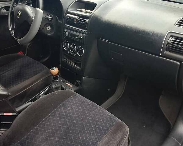 Синий Опель Астра, объемом двигателя 2 л и пробегом 312 тыс. км за 2700 $, фото 2 на Automoto.ua