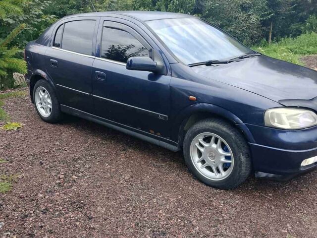 Синий Опель Астра, объемом двигателя 2 л и пробегом 312 тыс. км за 2700 $, фото 4 на Automoto.ua