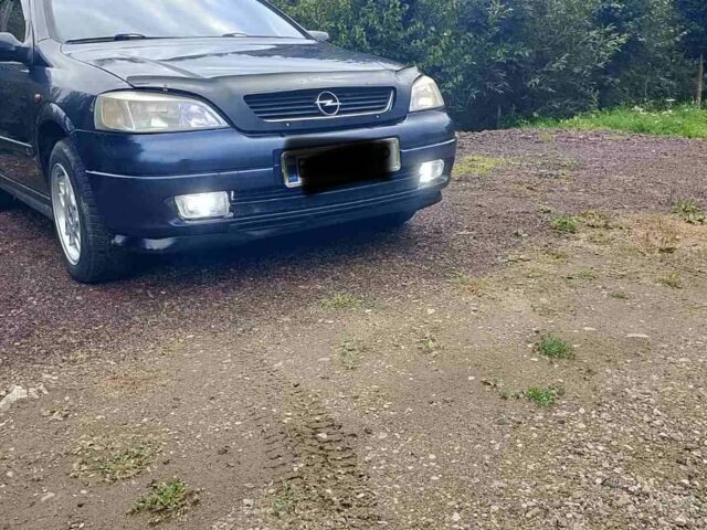 Синий Опель Астра, объемом двигателя 2 л и пробегом 312 тыс. км за 2700 $, фото 1 на Automoto.ua