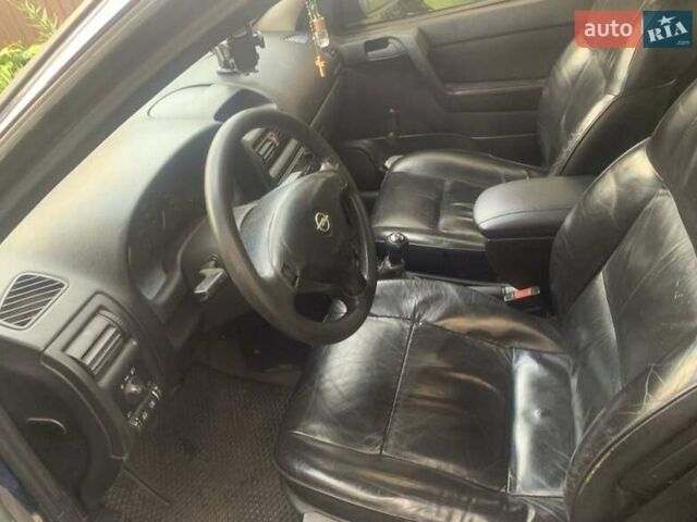 Синий Опель Астра, объемом двигателя 1.6 л и пробегом 270 тыс. км за 1650 $, фото 3 на Automoto.ua