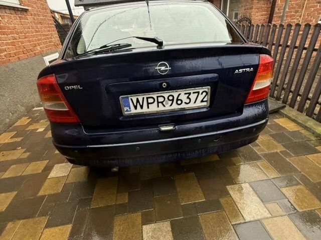 Синий Опель Астра, объемом двигателя 1.6 л и пробегом 270 тыс. км за 500 $, фото 3 на Automoto.ua