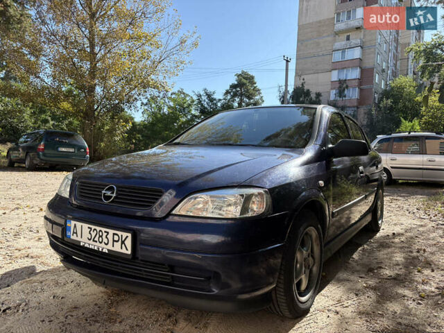 Синий Опель Астра, объемом двигателя 1.6 л и пробегом 205 тыс. км за 3000 $, фото 4 на Automoto.ua