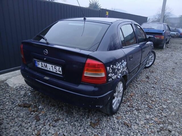 Синий Опель Астра, объемом двигателя 1.6 л и пробегом 280 тыс. км за 950 $, фото 3 на Automoto.ua