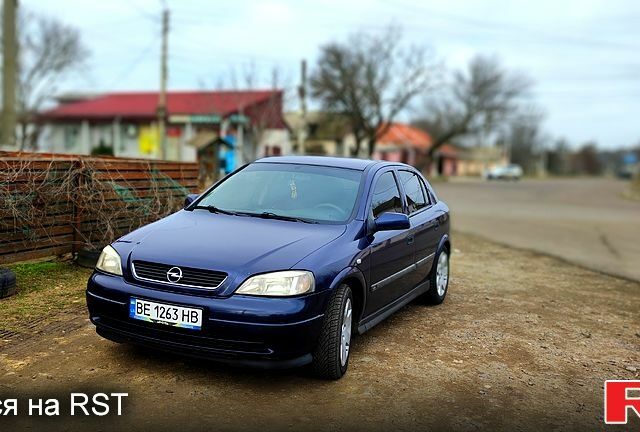 Синий Опель Астра, объемом двигателя 2 л и пробегом 330 тыс. км за 3550 $, фото 12 на Automoto.ua